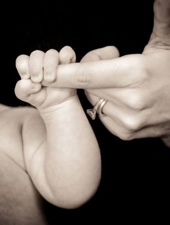 käsi, vauva, rengas, pidä Sarah Spencer - Dreamstime